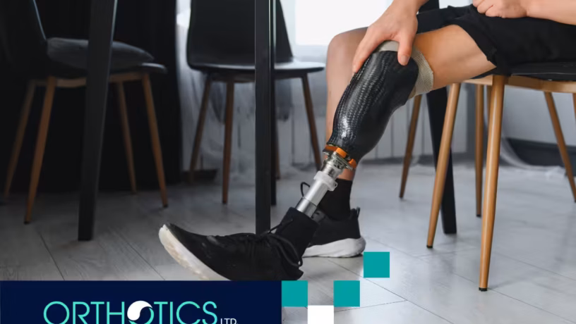 A man wearing prosthetics sitting