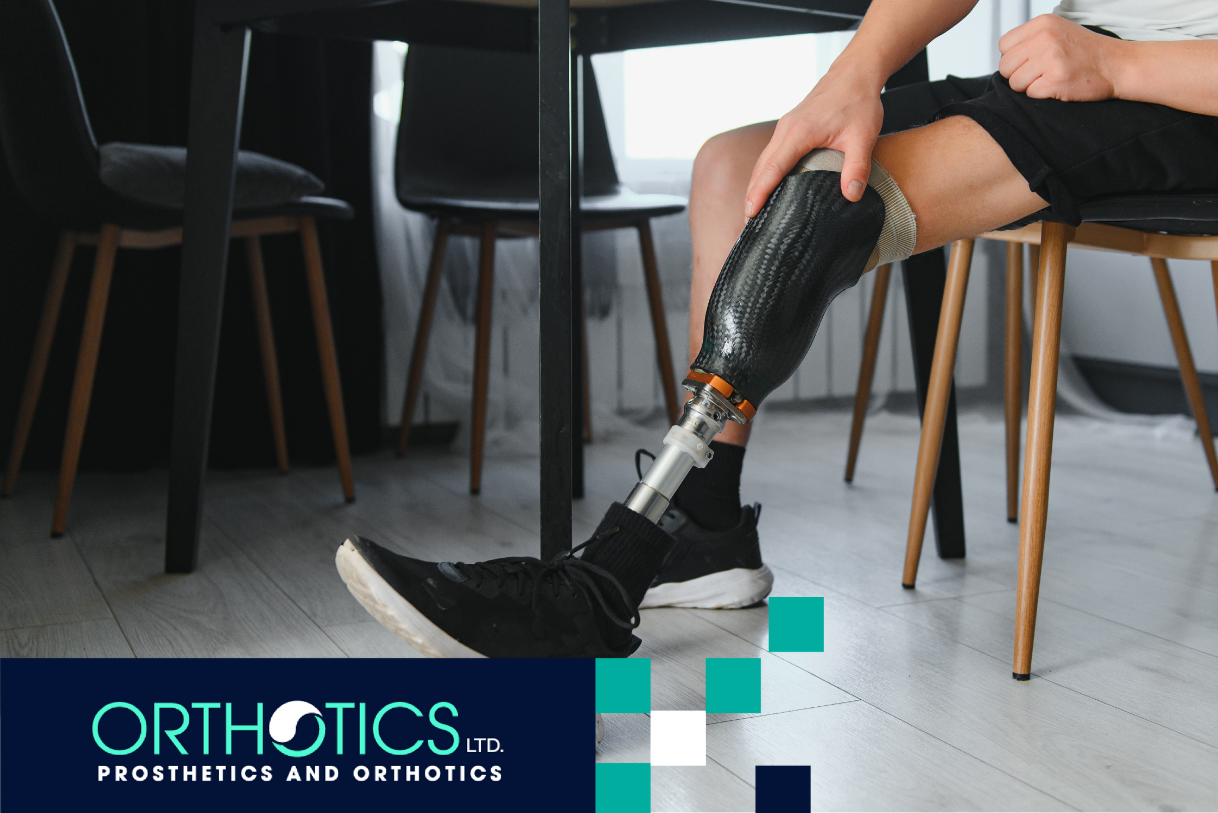 A man wearing prosthetics sitting