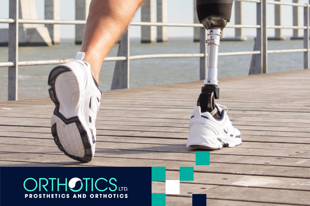 An amputee with prosthetics is running outdoors