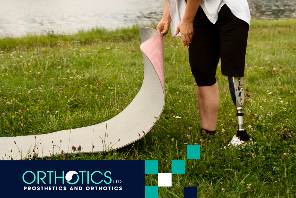 A teen with prosthetics doing yoga outdoors