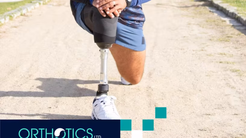 An amputee wearing a lower-limb prosthesis stretching his legs
