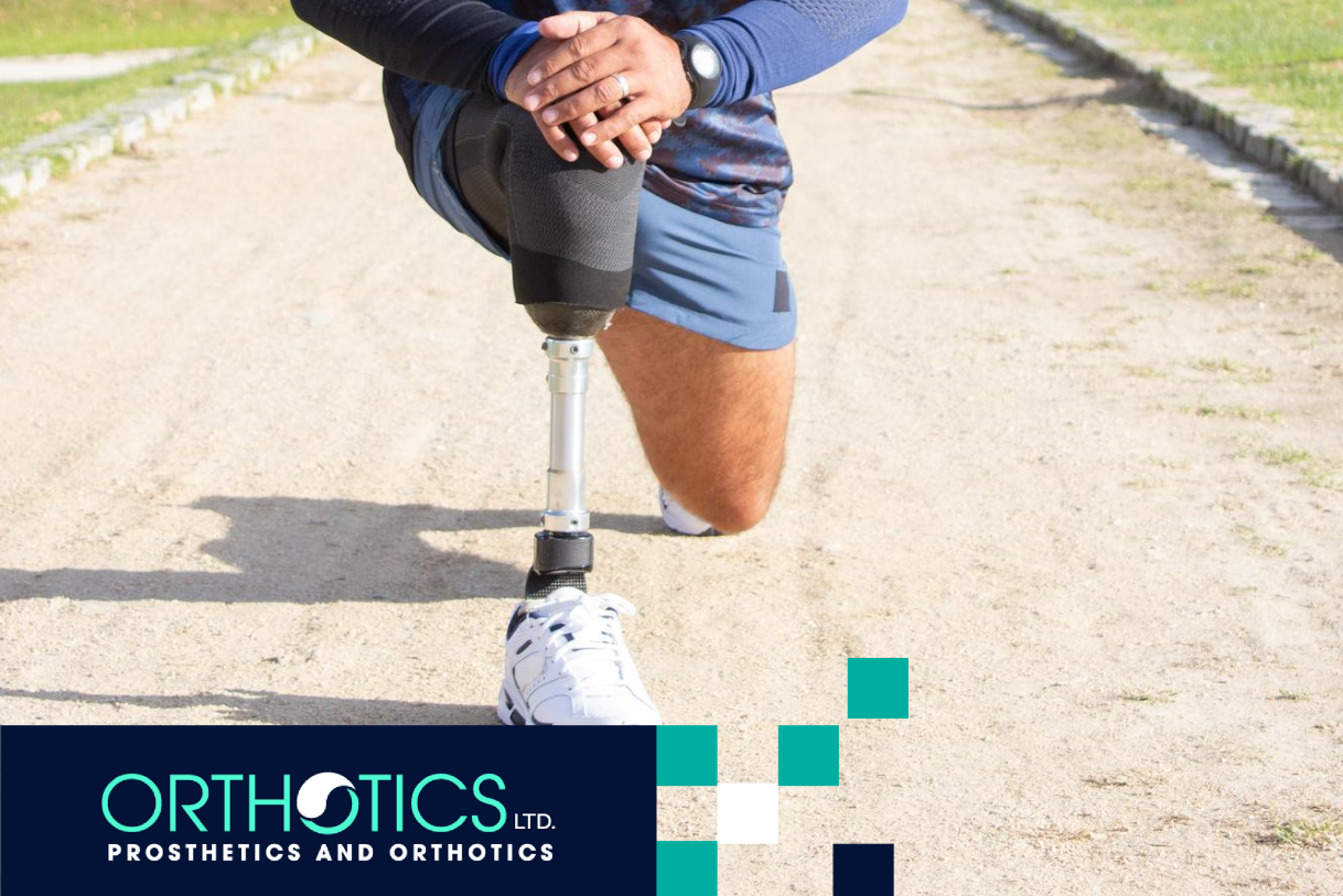 An amputee wearing a lower-limb prosthesis stretching his legs