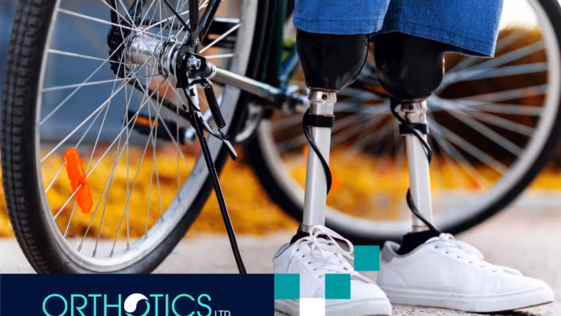 A cyclist wearing prosthetics