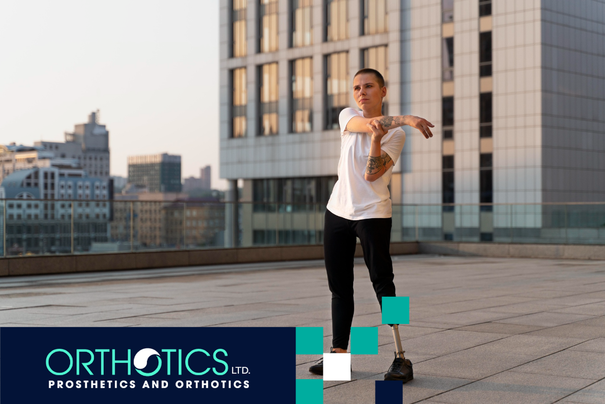 An amputee wearing a prosthetic stretching outdoors