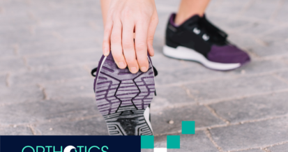 A woman is stretching her foot