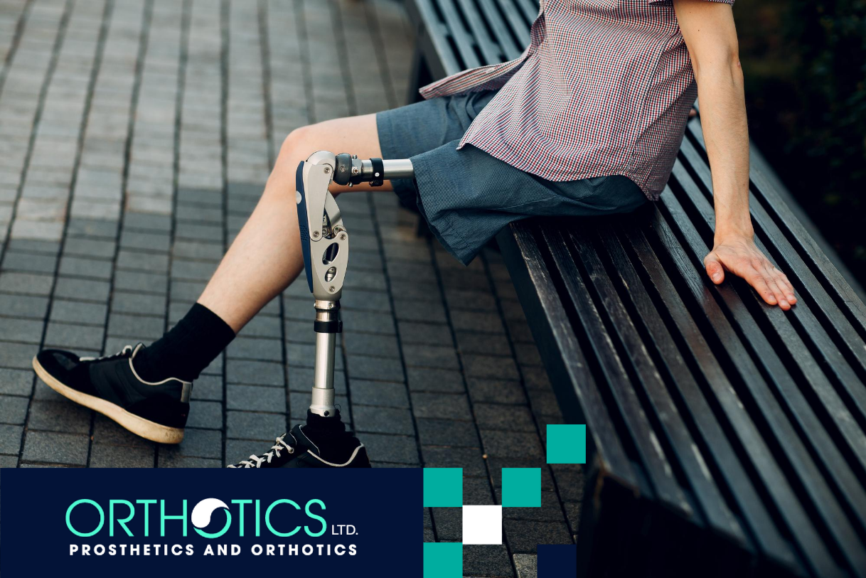 An amputee wearing prosthetics sitting on a bench