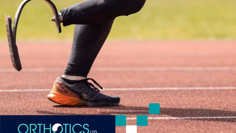 An athlete wearing prosthesis running in a track