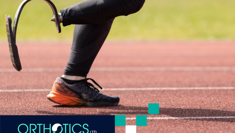 An athlete wearing prosthesis running in a track