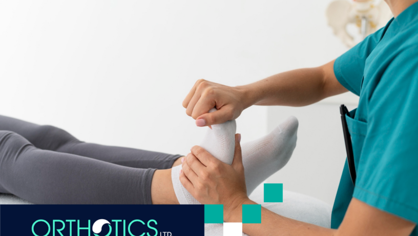 A medical staff stretching a woman's feet