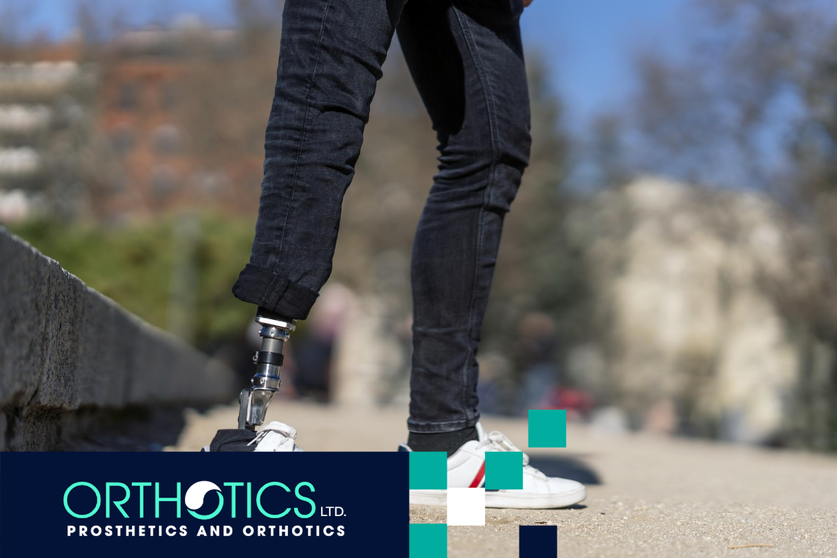 An amputee wearing a prosthetic standing outdoors wearing jeans and white shoes