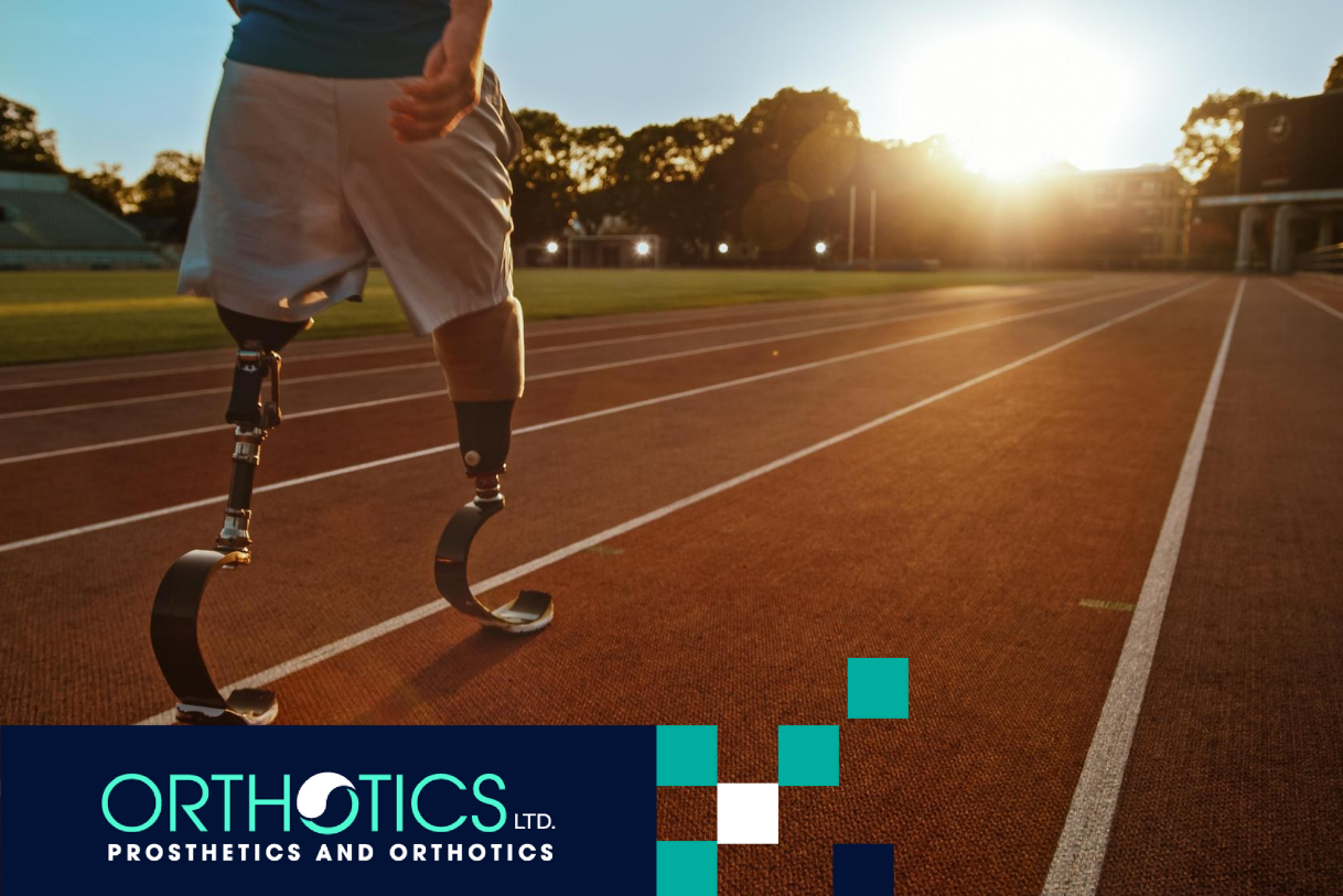 An athlete wearing a prosthetic training in a track