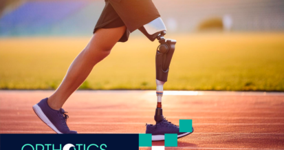 An amputee wearing prosthetics running in a track field