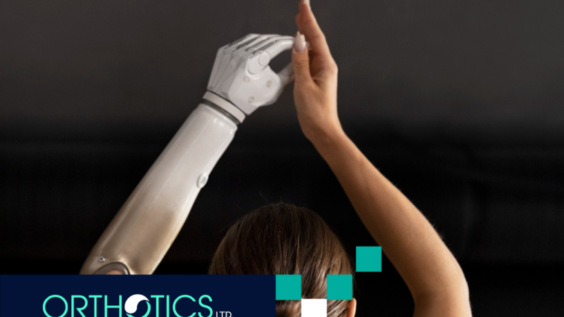 An amputee wearing a myoelectric limb doing yoga