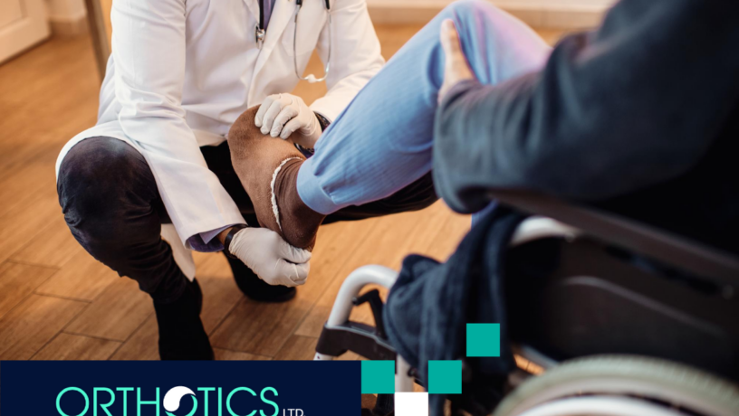 A prosthetist assisting a client during home prosthetic visit