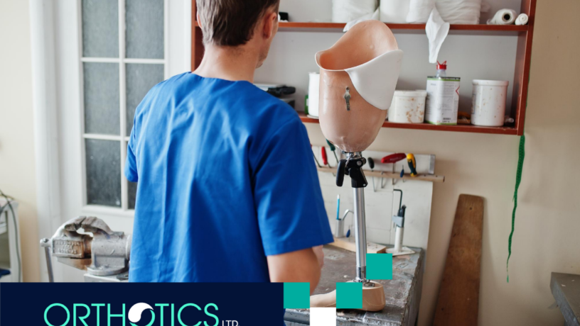 A prosthetist working on a prosthesis