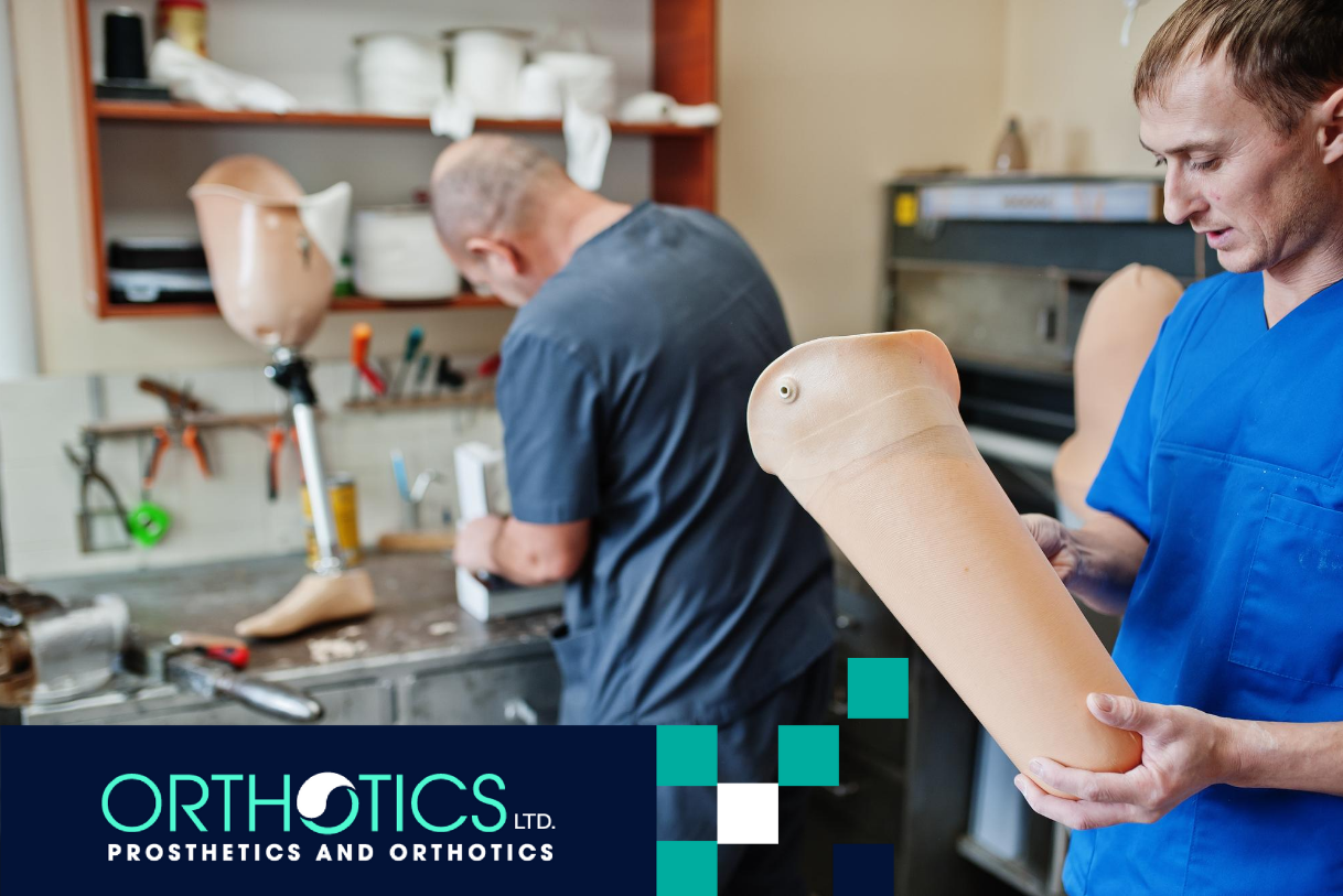 Two prosthetists working on prosthetic limbs