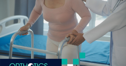 An amputee with a large body type is walking using a walker assisted by a doctor