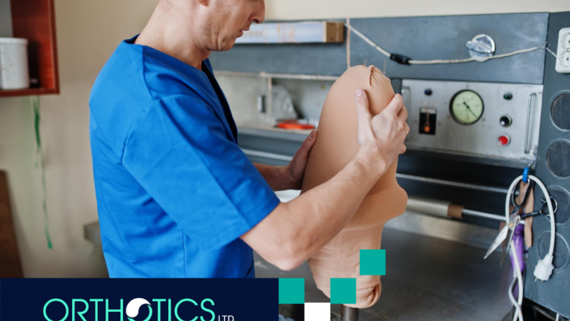 A prosthetist repairing a prosthetic limb