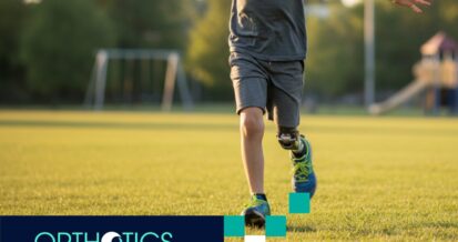 A child wearing a prosthetic limb running in a field
