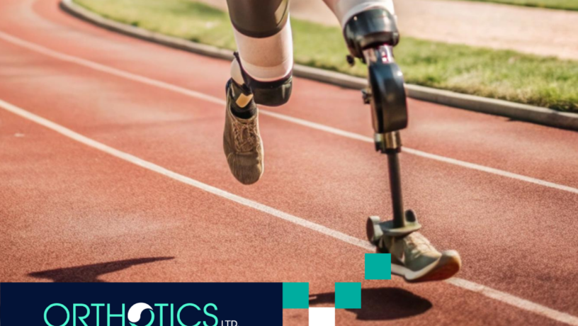 An athlete wearing prosthetics running in a track