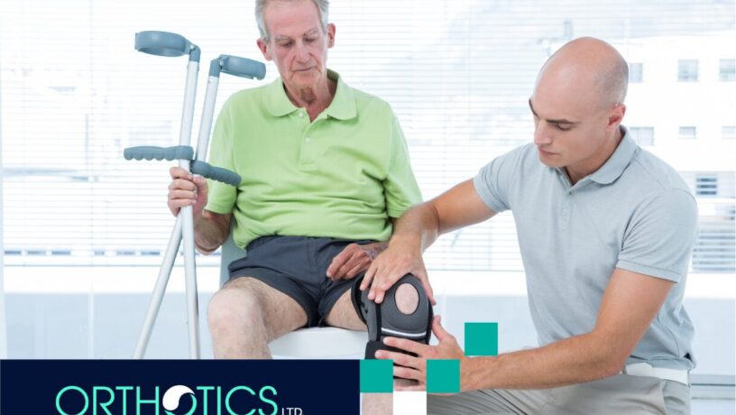 A senior talking to an orthotist