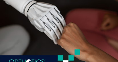 An amputee wearing a prosthetic arm fist-bumping another hand