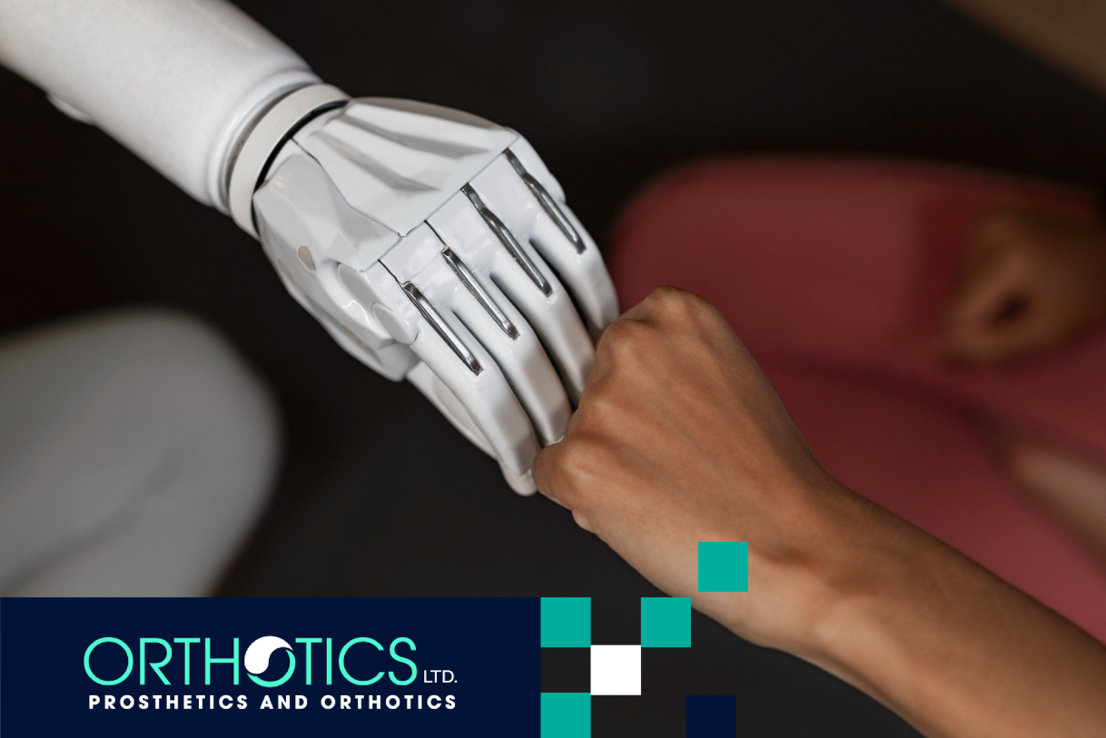 An amputee wearing a prosthetic arm fist-bumping another hand