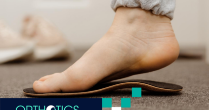 A foot fitting an orthotic insole