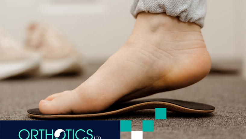 A foot fitting an orthotic insole