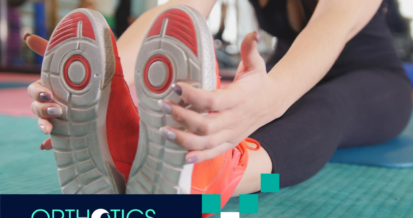 A person breaking in her shoes with orthotic insoles