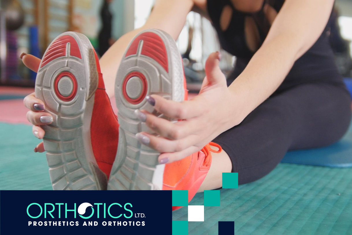 A person breaking in her shoes with orthotic insoles