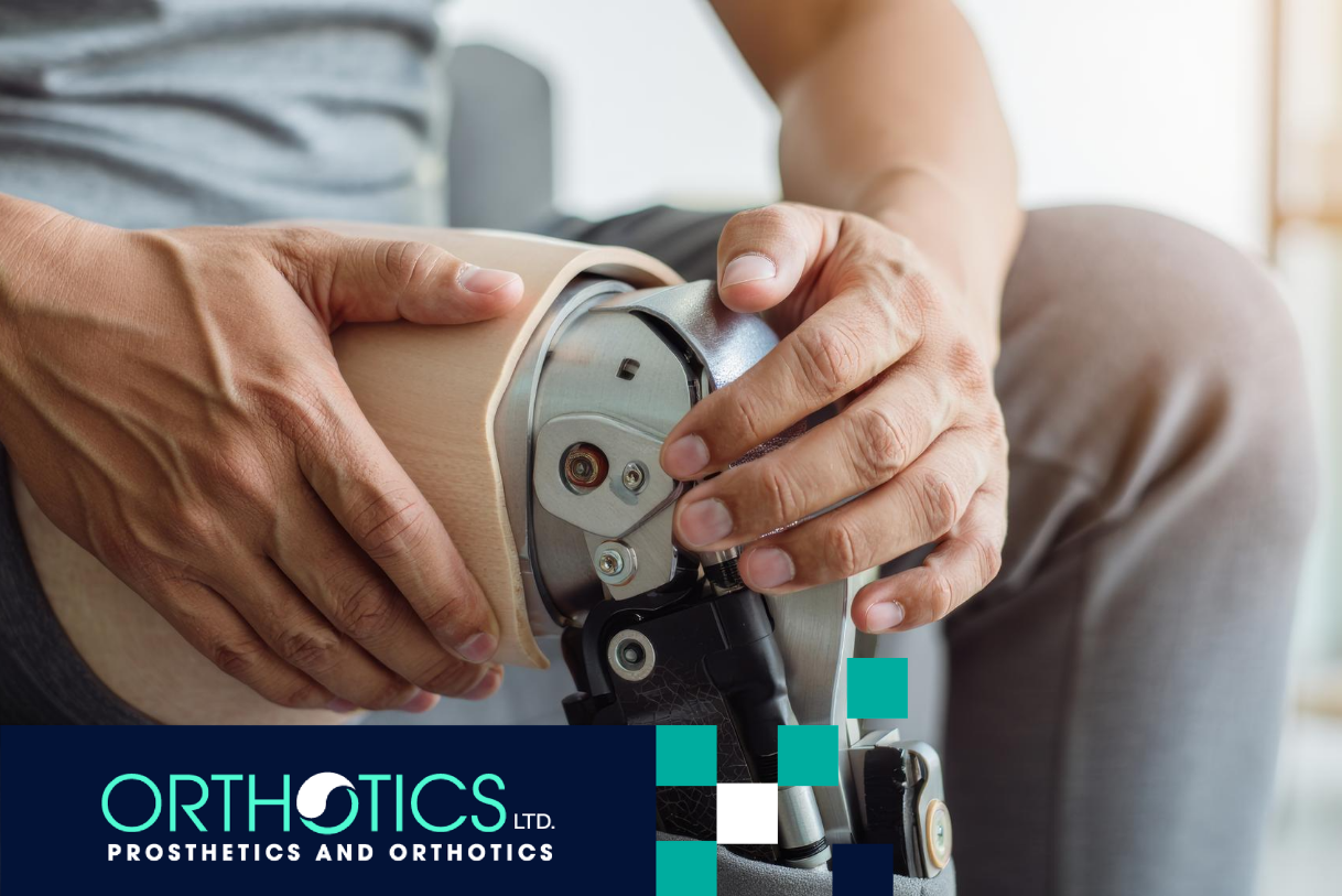 A man wearing prosthetic sitting on a couch