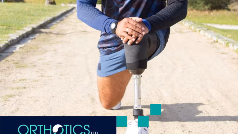 An amputee wearing a prosthetic stretching outdoors