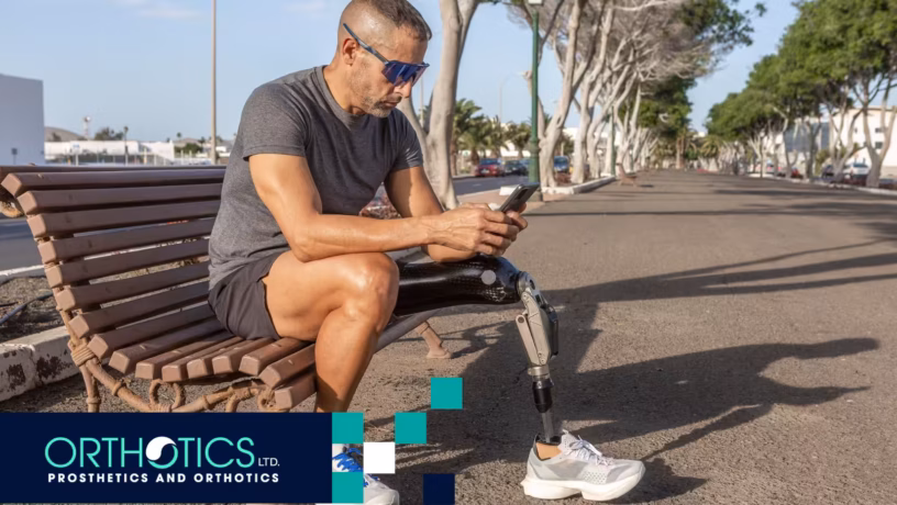 summer prosthetic care - hero A man sitting on a bench looking at tips on prosthetic socket care in summer