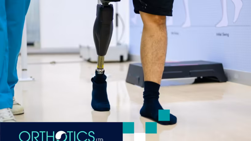 A man wearing a prosthetic limb walking in a room