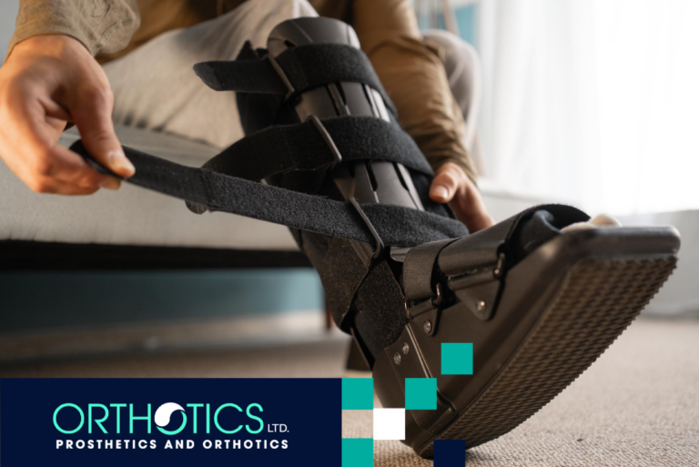 Man taking off an ankle-foot orthosis on his leg, sitting on a sofa at home