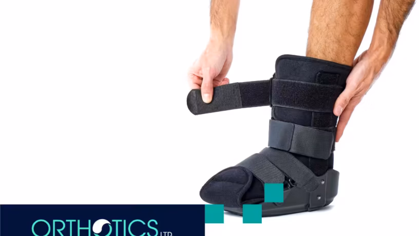 A person putting on c-brace orthosis