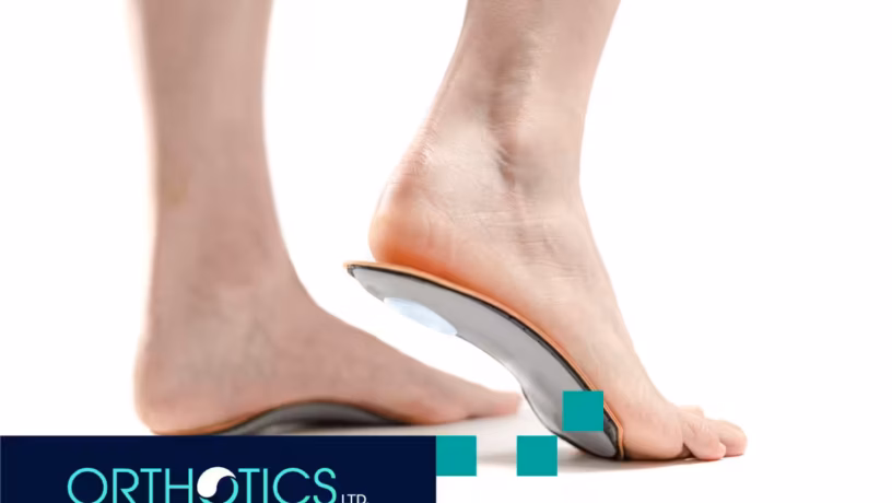A person standing on orthopedic insoles